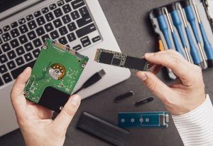 SSD upgrade being fitted to a laptop at Criddle Computer Care in Crawley